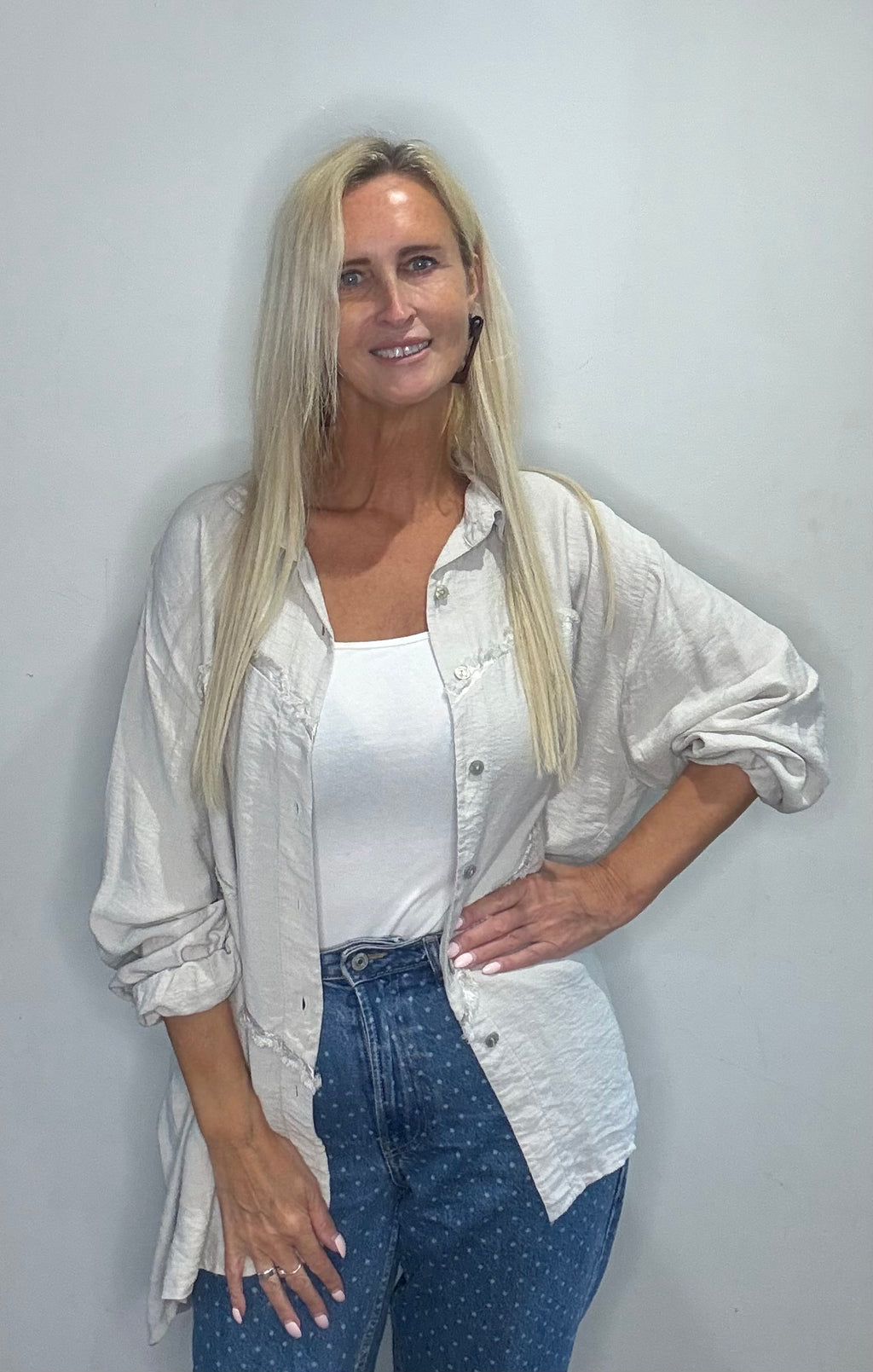 Our Cute Valentine Linen Shirt/Shacket with a Heart detail on the front.