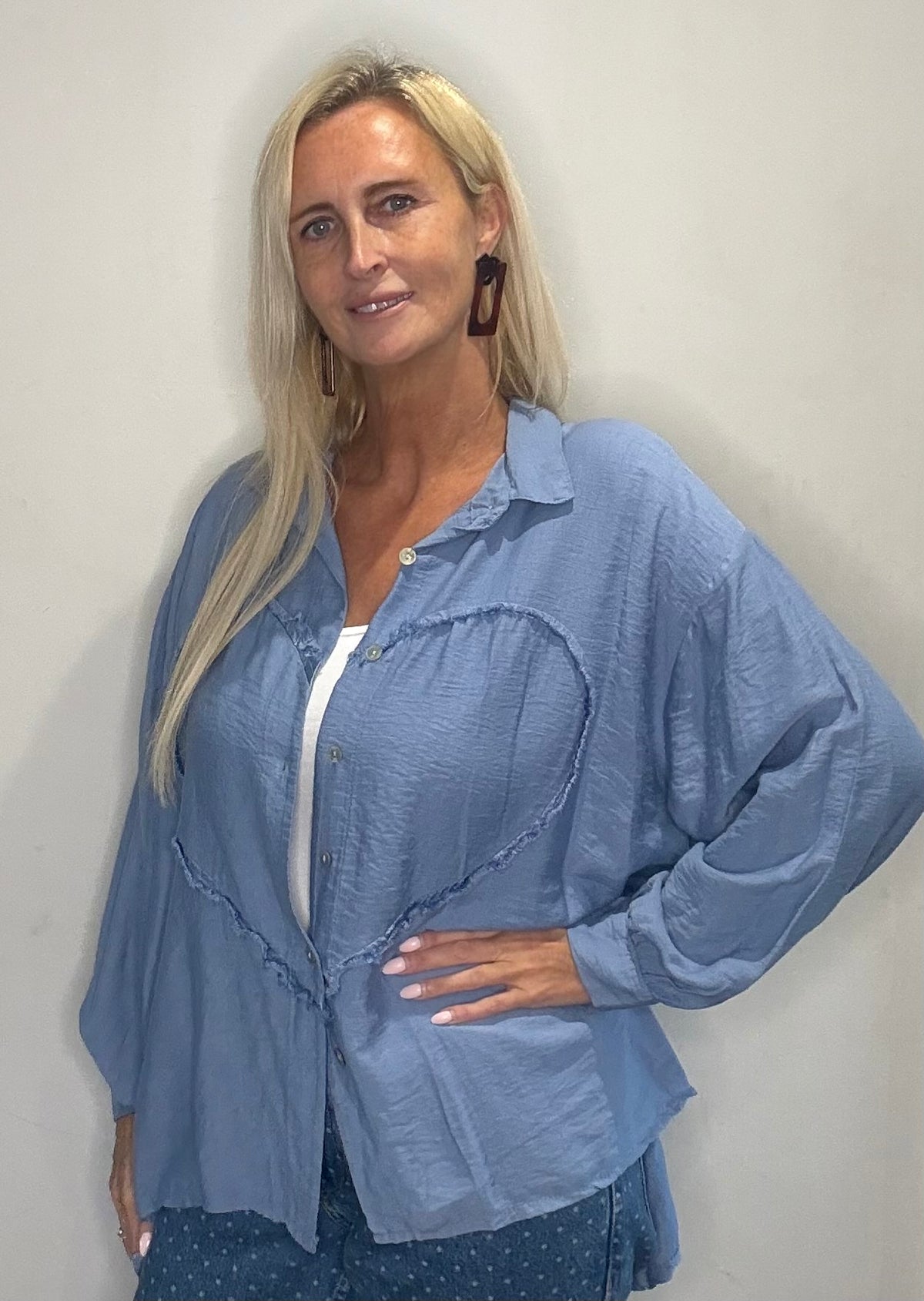 Our Cute Valentine Linen Shirt/Shacket with a Heart detail on the front.